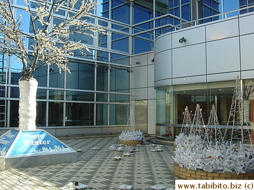 The courtyard has decorations celebrating winter...