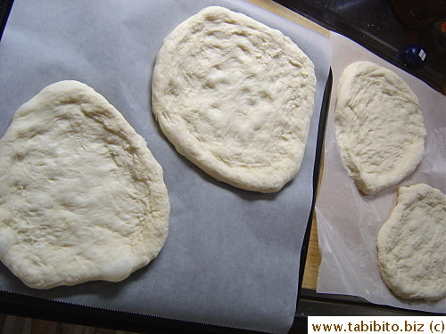 The dough's divided into four pieces
