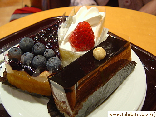 Their dessert (blueberry cake, strawberry sponge cake, chocolate cake)