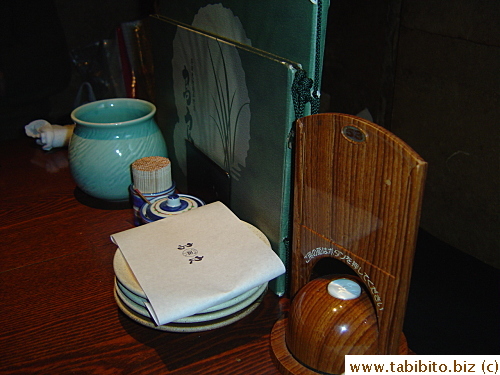 The brown thing is the bell to call for servers