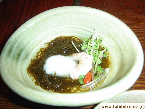 The white stuff is grated Japanese yam over seaweed in a tangy dressing