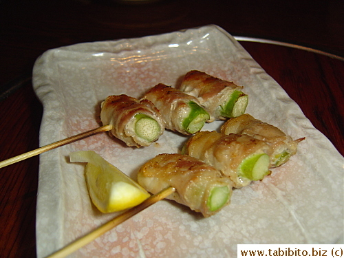 Asparagus wrapped in thinly slices of belly pork $2.5 each