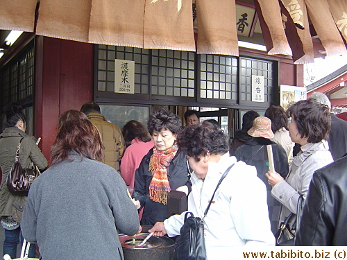 You can buy special incense for 2 bucks a pop, light it in the cylinder thingie and let it burn in the big incense pot