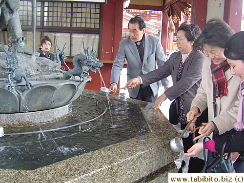 Hands are cleaned before going inside the temple to pray