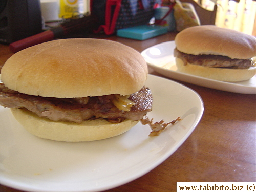 Pork chop with caramelised onion in a homemade bun