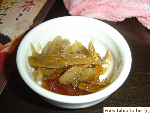 Amuse (shaved burdock roots in dashi jelly), included in the cover charge