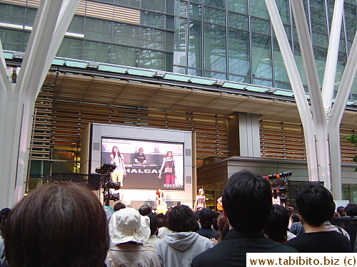 A group performs in the Plaza that day.  As soon as I took their picture, a staff from the concert immediately materialized to stop me.  I thought the idea of the free performance is publicity, why would they want to stop people from taking pix and spreading the word??