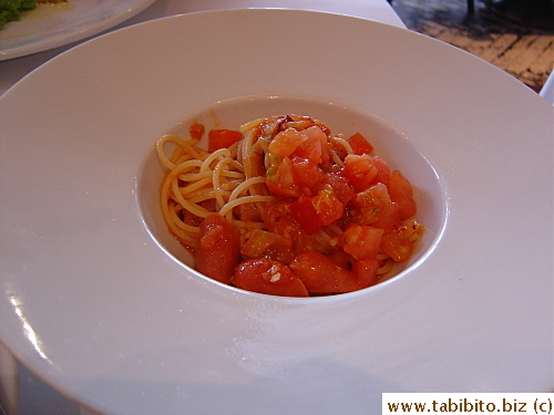 Spaghetti with chorizo sausage, eggplant and fresh tomatoes