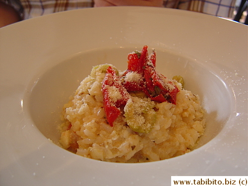Risotto with smoked fish, olives and semi-dried tomatoes
