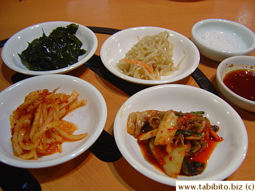 Complimentary banchan (kimchi stuff, seaweed, bean sprouts)
