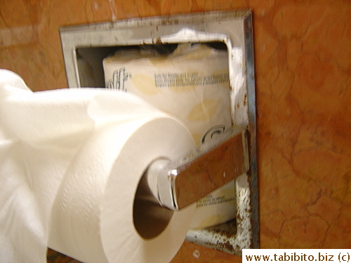 Rusty toilet paper holder