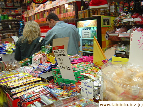 Chock-full of candies, from floor-to-ceiling shelves on the wall and in the aisles and numerous bins