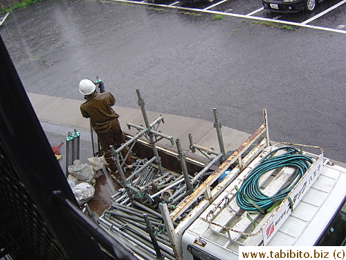 It's hard to see in this picture, but poor fellas had to work in pouring rain the day they came to set up the frame