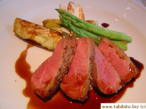 Our entree: Roasted duck breast with grilled vegetables, cooked medium to retain its tenderness and juiciness