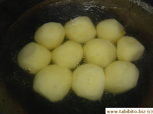 Boil potatoes over medium high heat for 20 minutes