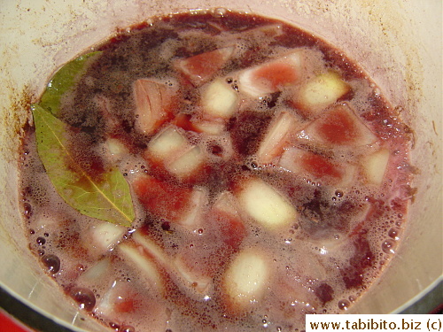 Wine is added to deglaze the pan