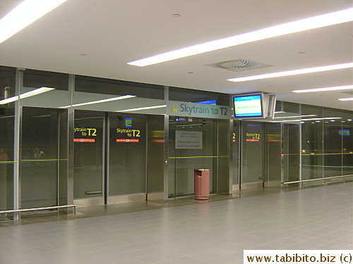 Waiting for the Skytrain to take us to T2