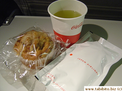 On the return flight, rice crackers and muffin