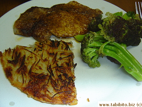 Dinner: Creole pork chop, crunchy potato cake, purple broccoli