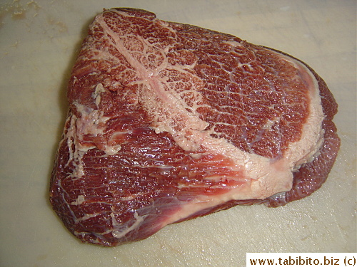 Tons of connective tissue and sinew and stuff run through the meat. Because the cow constantly chews food and the cheeks get plenty of exercise, this cut of meat is very flavorful