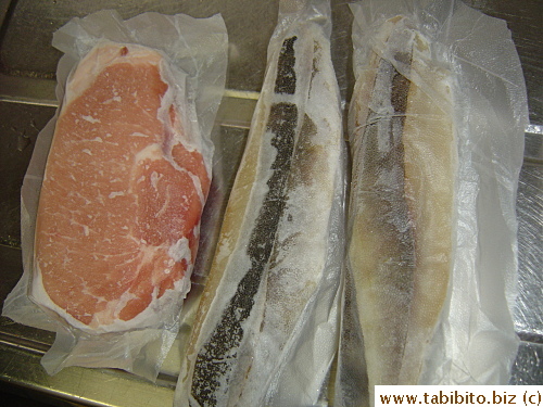 Pork chops and fish etc are sealed for freezer storage