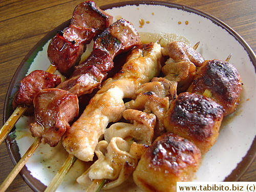 (L to R) Grilled chicken hearts, beef tongue, chicken, intestines, chicken meat balls, 80Yen/US$.9 each  