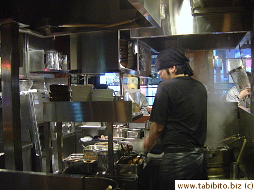 This man really shook the cooked noodles to death after he scooped them out of the boiling water, it's almost a show he was performing