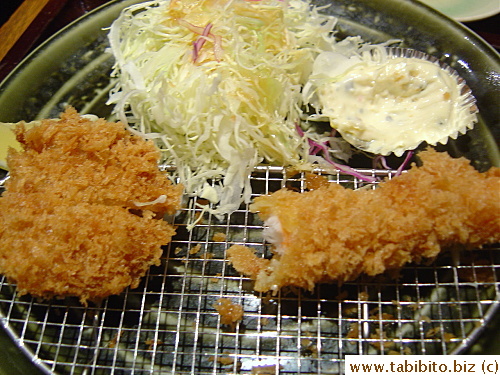 I only remembered to take my set's picture after I ate half of it...1180Yen/$13.  It did have a fried breaded pork tenderloin, a prawn, an oyster and a crab croquette