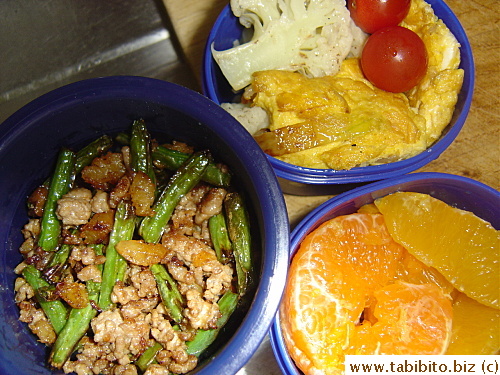 Stirfried minced pork with dried shrimp and string beans, onion with egg, cauliflower, cherry tomatoes, mandarin and orange