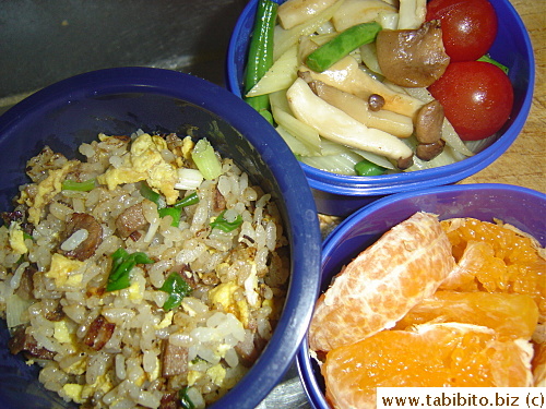 Fried rice, stirfried onion, celery, green beans and mushrooms, cherry tomatoes, mandarin