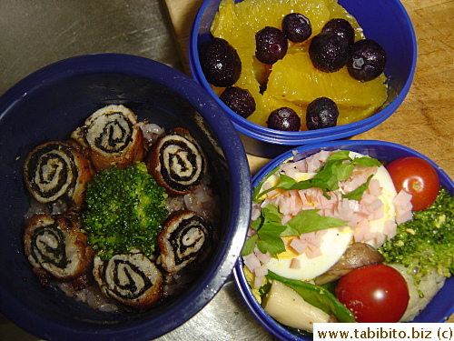 Pork and nori roll-up, broccoli, cherry tomatoes, cauliflower, sauteed snow peas and mushrooms, hard-boiled egg garnished with chopped ham and parsley