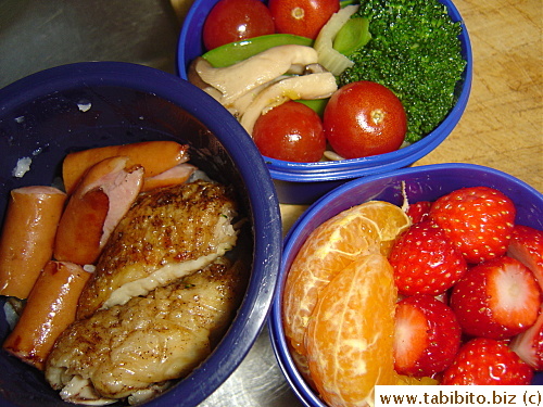 Grilled wings, sausages, broccoli, stirfried onion, celery, snow peas and mushrooms, cherry tomatoes, mandarin and strawberries