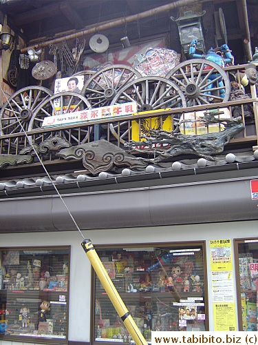 Walking back to the station, saw this very old toy store and its balcony full of junk, oh excuse me, collectibles