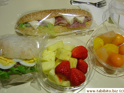 Breakfast obtained from Isetan's food basement: Camembert and pastrami sandwich, egg/salad/pastrami sandwich, fruit