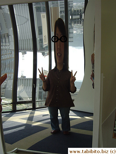 The floor below the Observatory is a souvenir shop and some fun things for people to take pictures of such as this distorted mirror