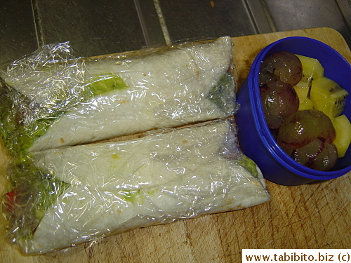 Avocado and imitation crab tortilla wrap, kiwi and grapes