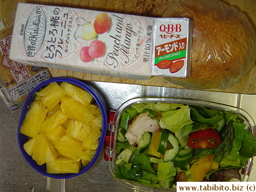 Chicken salad, pineapple, juice, almond cheese, roll