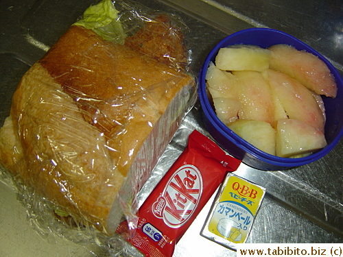 Fish sandwich, peach, KitKat, Camembert cheese
