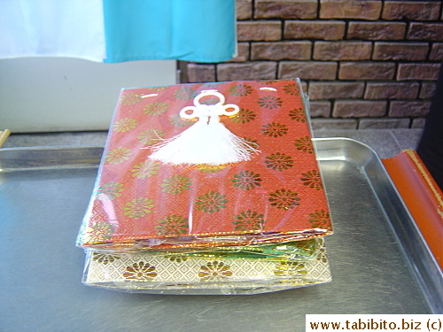 When we returned to the room, we picked a red case for the urn from five different colors