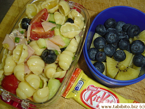 Pasta salad, blueberries and kiwi, Mango KitKat