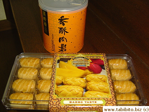Souvenir (pastries) KL bought in Singapore airport for the office and pork floss for me! 
