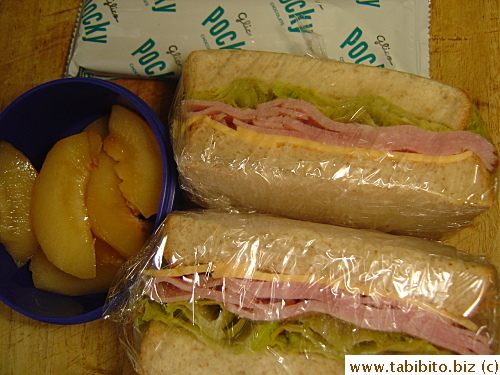 Ham/cheese/lettuce sandwich, peaches, Pocky