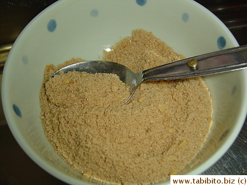 Sugar mixture has chopped peanuts in it