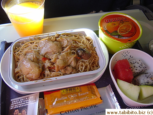 Cathay Pacific, Hong Kong to Ho Chi Minh breakfast: chicken and noodles, mixed fruit