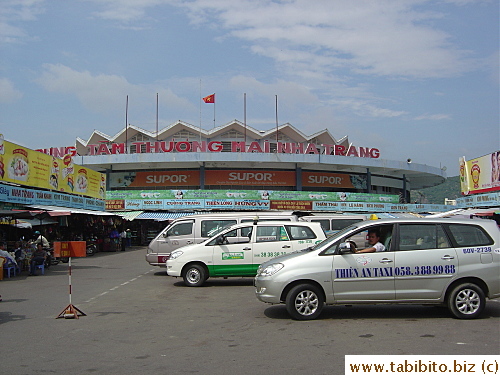 Plenty of taxi waiting outside the market