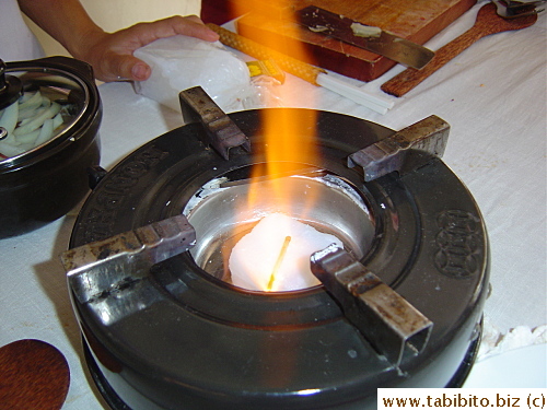 Burning wax fuels the fire for our cooking