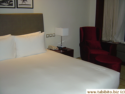 Very large bed which easily sleeps three big adults