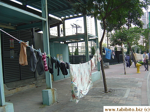 Walking away from the mall, we saw laundry being dried on the road?!
