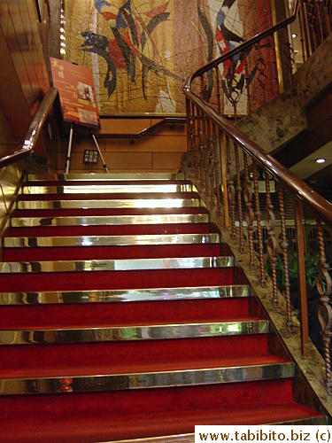 Staircase leads to their second floor dining room