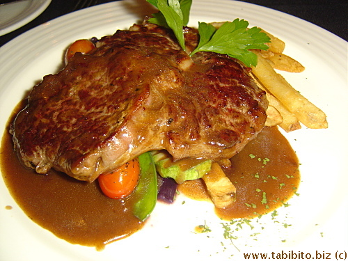 KL's rib eye was surprisingly flavorful and tender